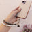 Pearl Wrist Phone Lanyard with Hand-Woven Leather & Floral Accent