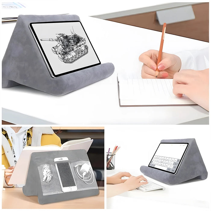 Multifunctional pillow-type tablet and phone holder, suitable for iPad and other devices, made from sponge material for added comfort.